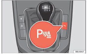Consola central: botão de auxílio de estacionamento