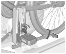Desmontar a bicicleta do sistema de transporte traseiro